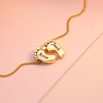 Gold engraved little thick footprint necklace