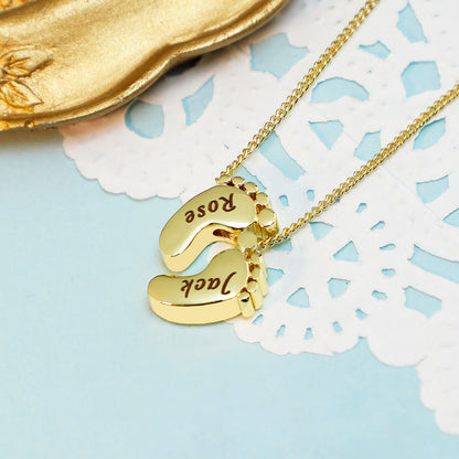 Gold engraved little thick footprint necklace